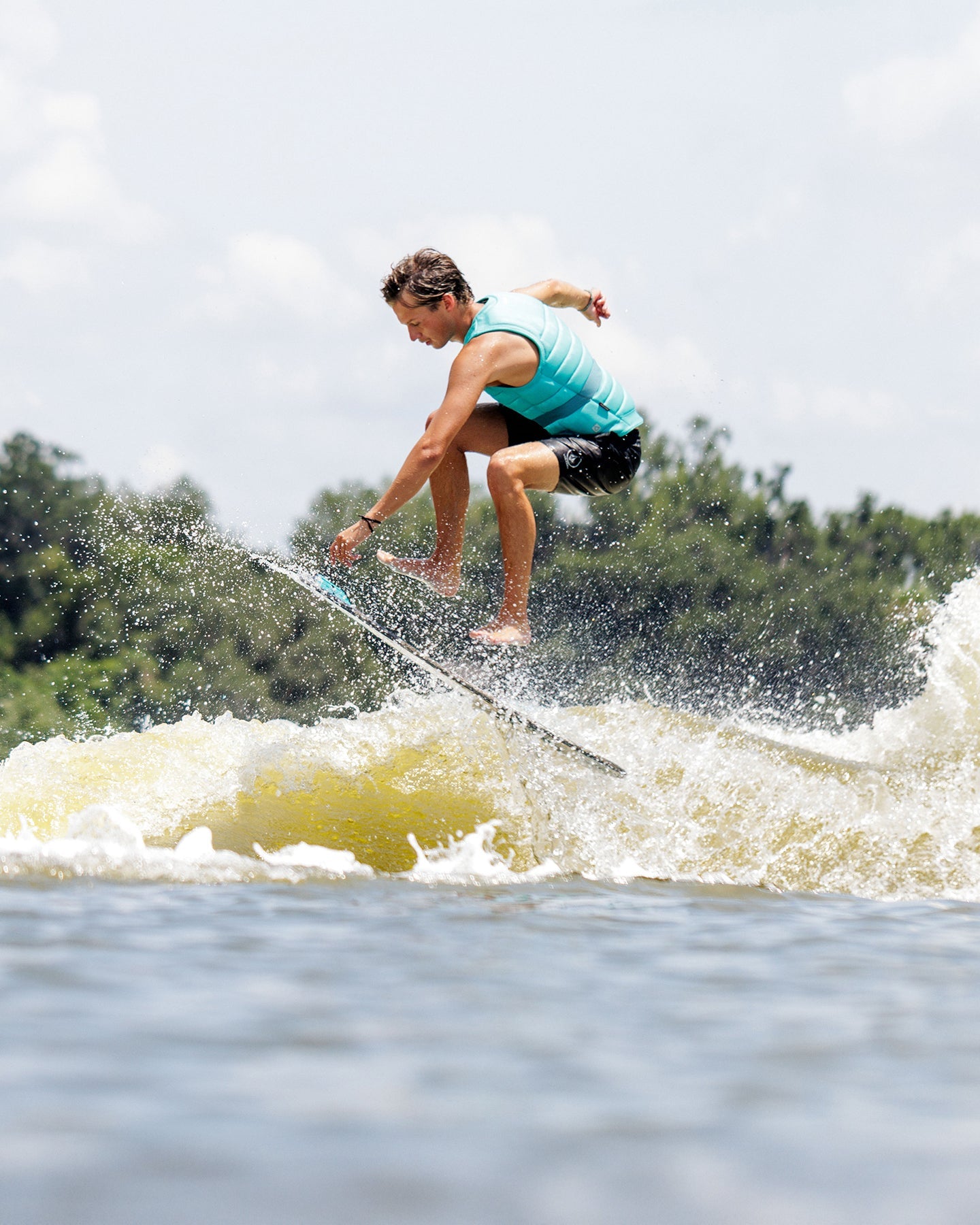 Follow Asset Impact Vest - Teal Lifestyle 3