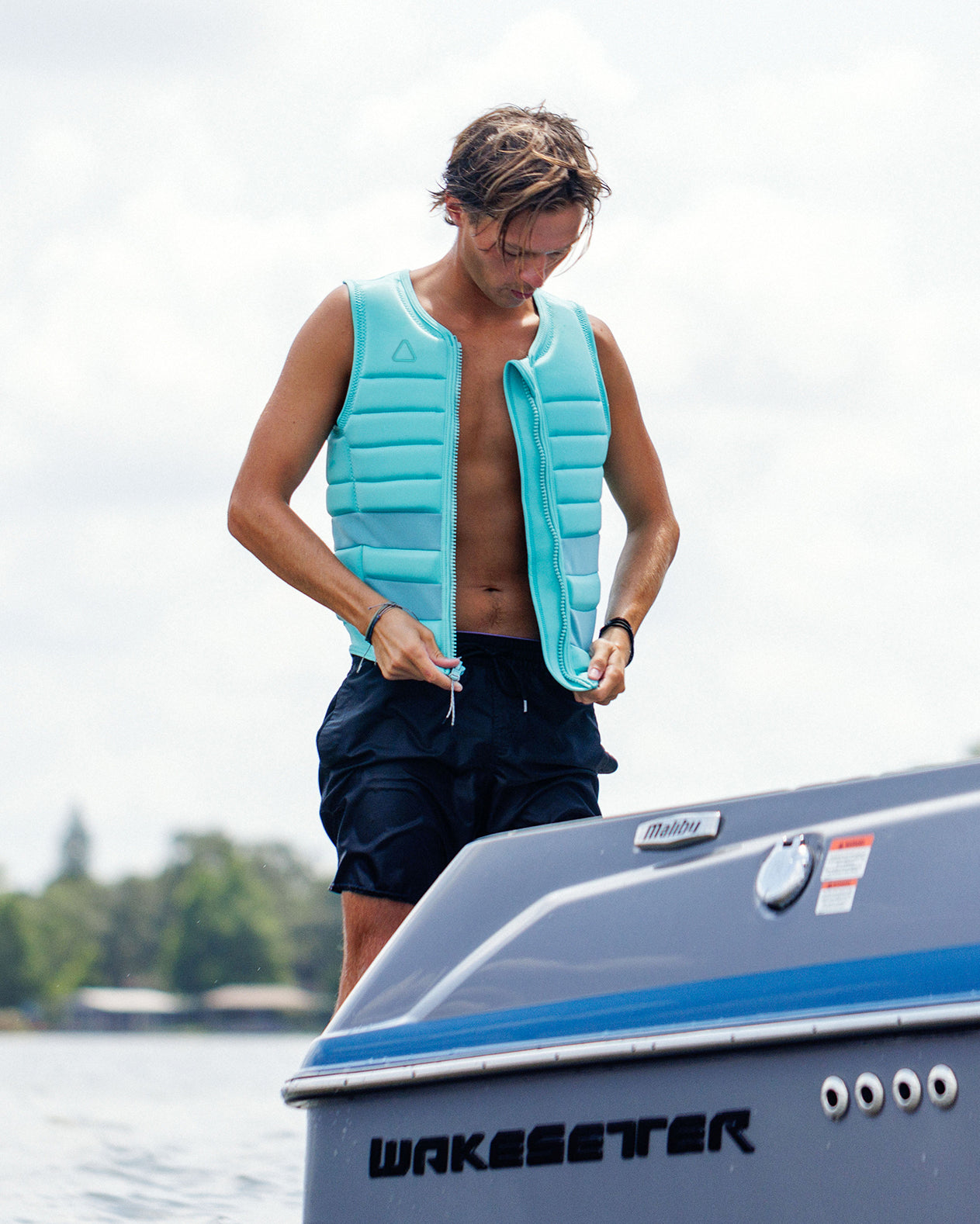 Follow Asset Impact Vest - Teal Lifestyle 4